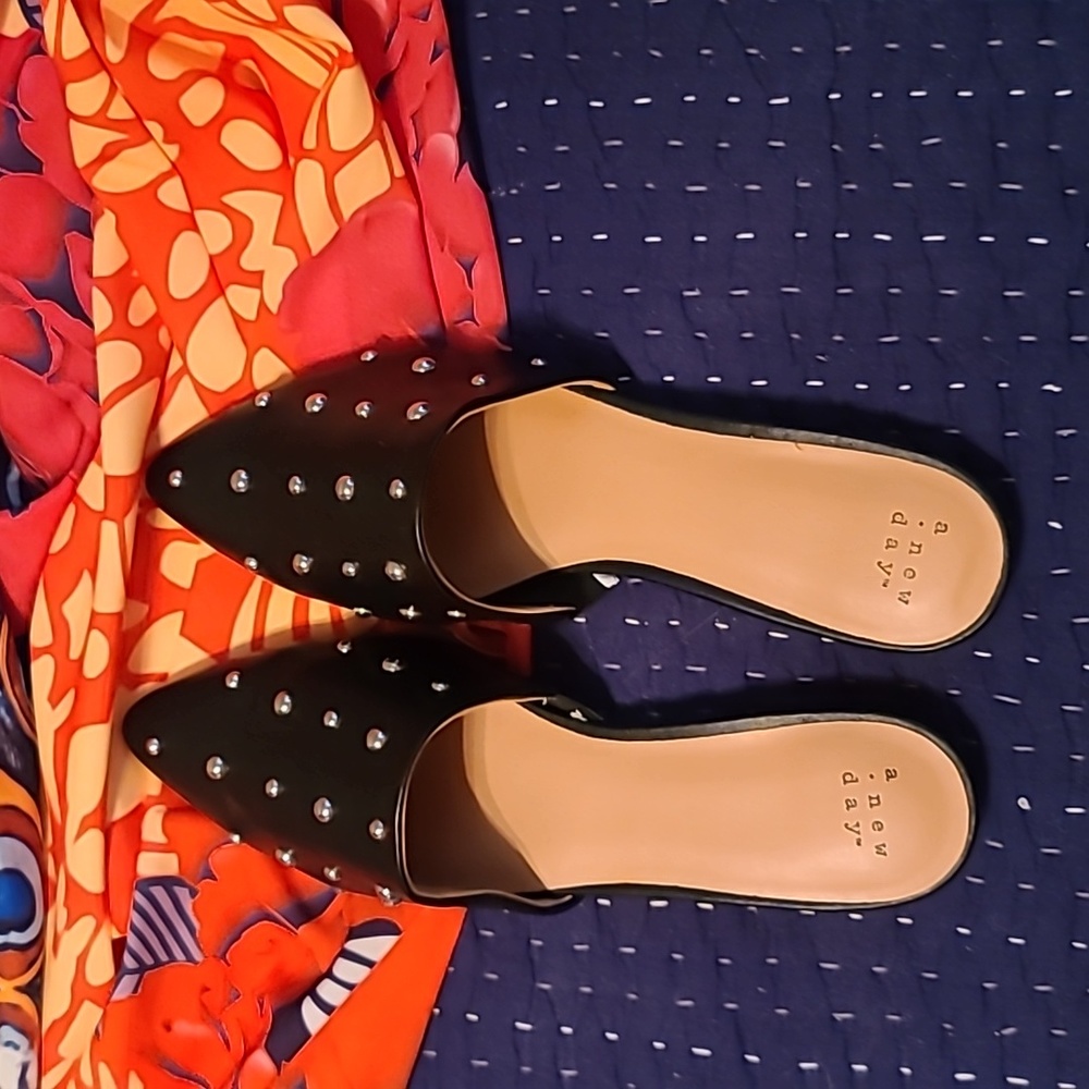 Silver studded flat slides. Never worn.